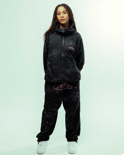 MELTED STONE NYLON TIE AND DYE TRACK PANTS BLACK