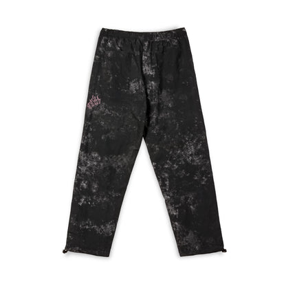 MELTED STONE NYLON TIE AND DYE TRACK PANTS BLACK