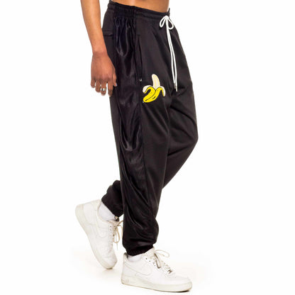 GRIMEY JUNGLE PUNCH MESH TRACK PANTS BLACK