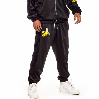 GRIMEY JUNGLE PUNCH MESH TRACK PANTS BLACK