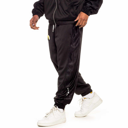 GRIMEY JUNGLE PUNCH MESH TRACK PANTS BLACK