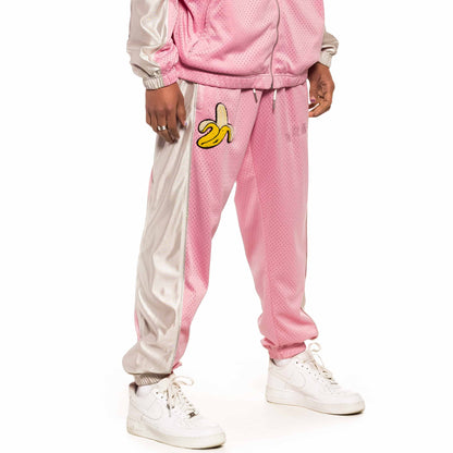 GRIMEY JUNGLE PUNCH MESH TRACK PANTS PINK