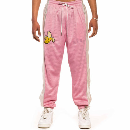 GRIMEY JUNGLE PUNCH MESH TRACK PANTS PINK
