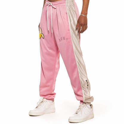 GRIMEY JUNGLE PUNCH MESH TRACK PANTS PINK