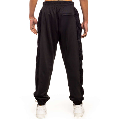 GRIMEY JUNGLE PUNCH MESH TRACK PANTS BLACK
